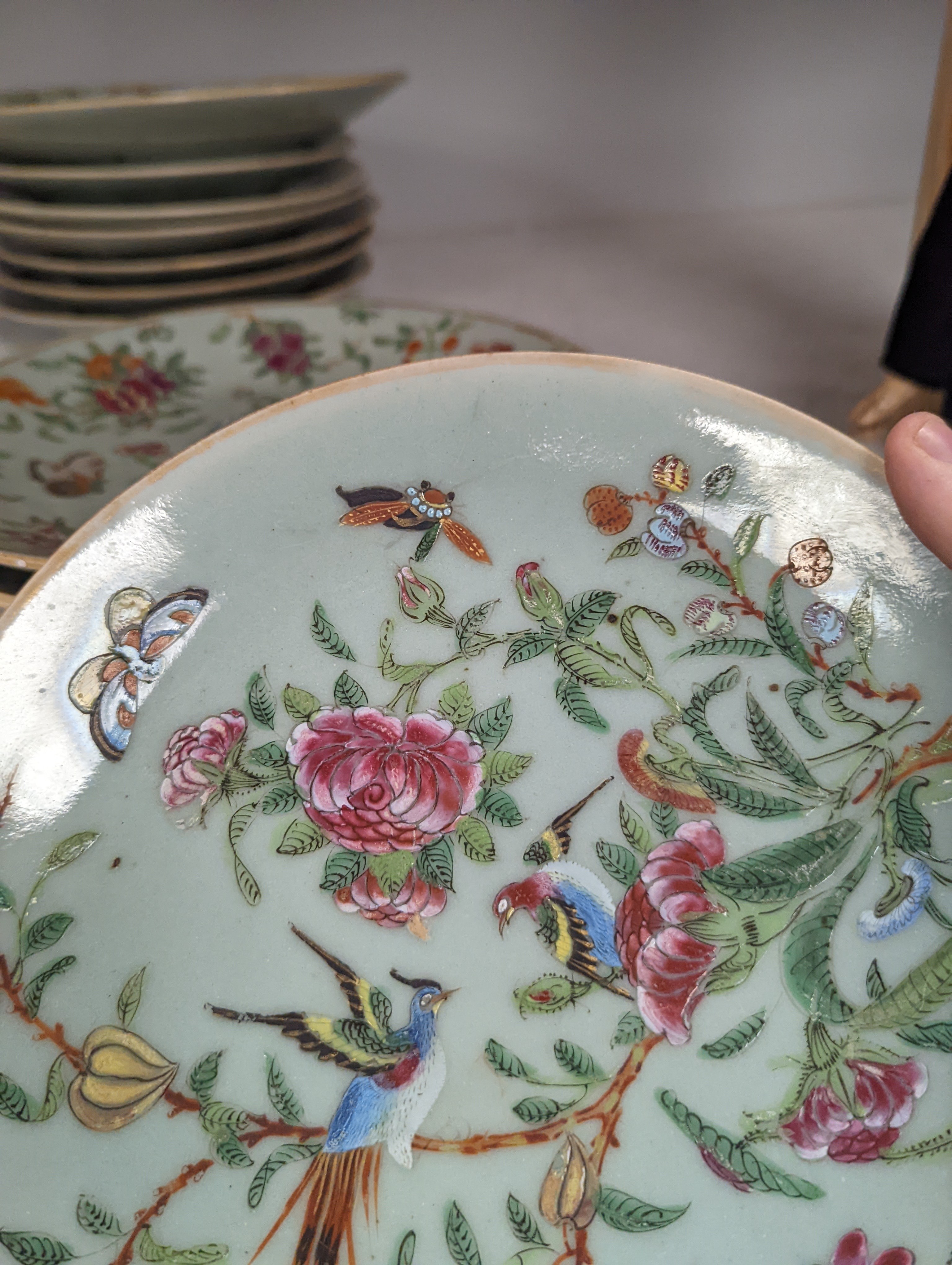 Eleven Chinese celadon ground famille rose plates, mid 19th century 22cm